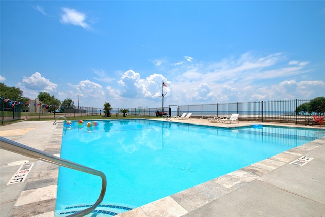 view of swimming pool featuring a patio