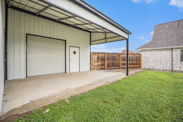 garage with a yard