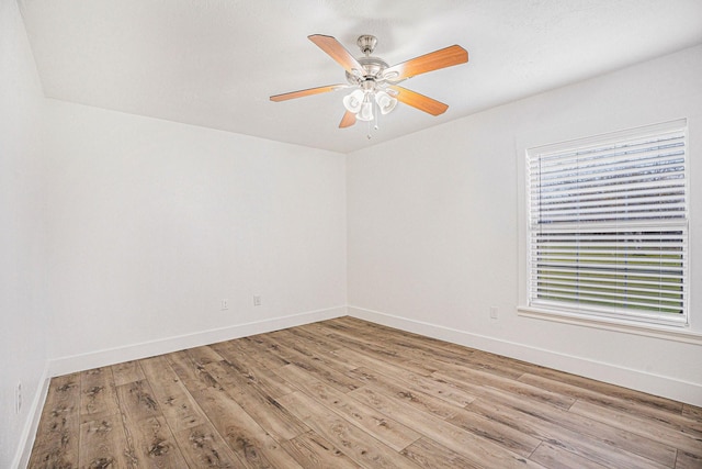 unfurnished room featuring ceiling fan and light hardwood / wood-style flooring