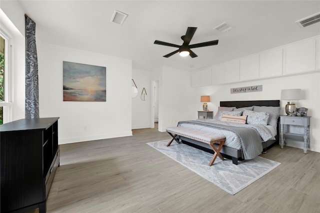 bedroom featuring wood-type flooring and ceiling fan