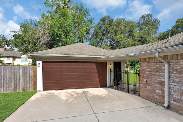 ranch-style home with a garage