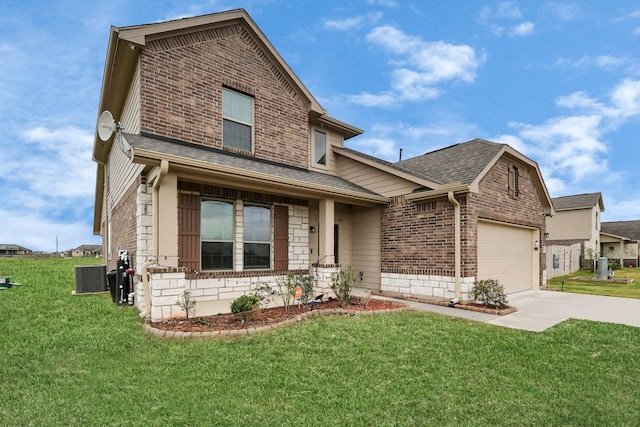 view of front of house featuring a garage, central air condition unit, and a front yard