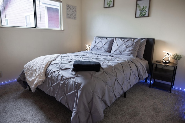 bedroom featuring carpet