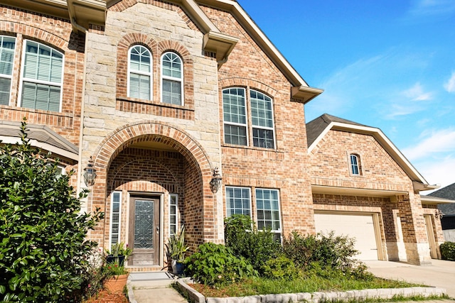 view of front of property featuring a garage