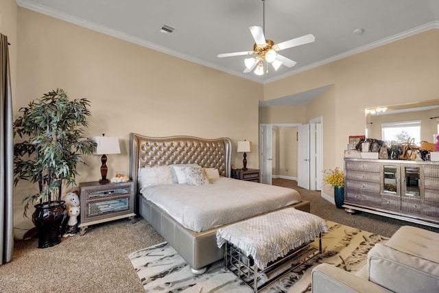 bedroom featuring carpet flooring, ceiling fan, and crown molding