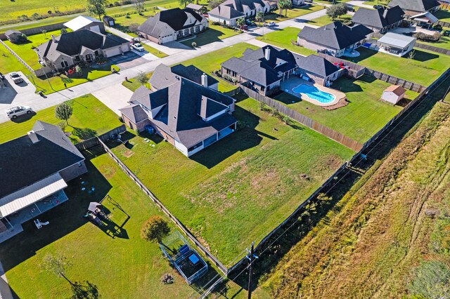 11411 Kings Point Blvd, Mont Belvieu, TX 77535 - aerial perspective of suburban area featuring a pool