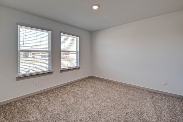 view of carpeted spare room