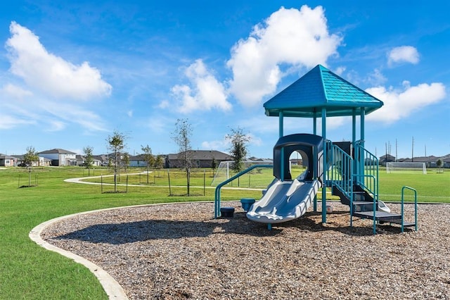 view of playground featuring a lawn