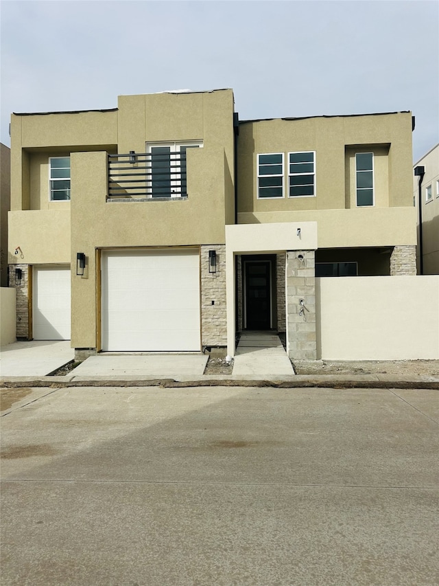 view of front of property featuring a garage