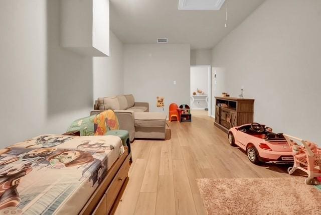 living room with light hardwood / wood-style flooring