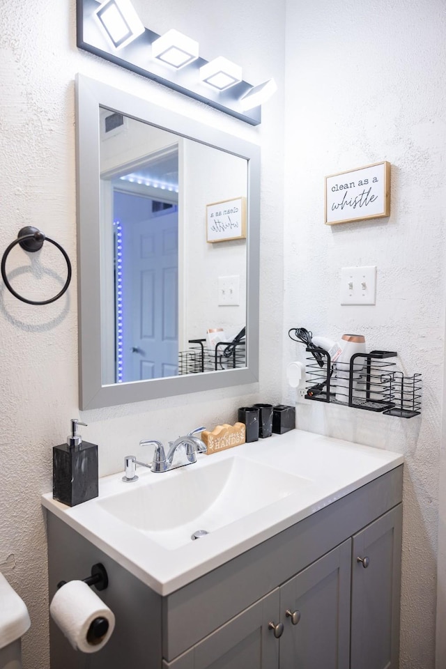 bathroom featuring vanity