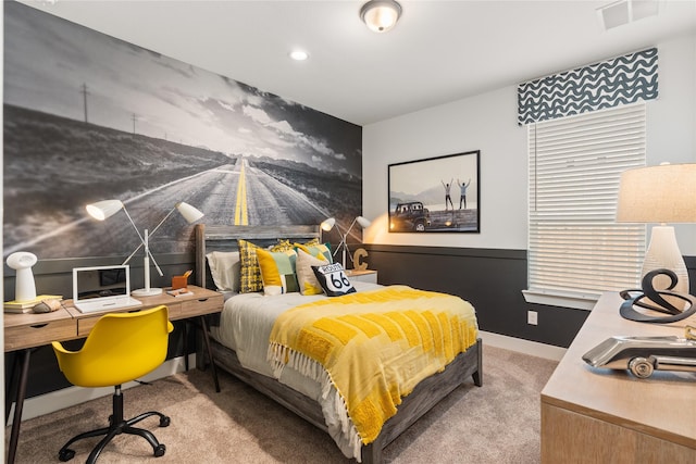 bedroom featuring light colored carpet