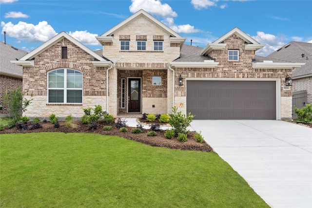 craftsman inspired home with a garage and a front yard