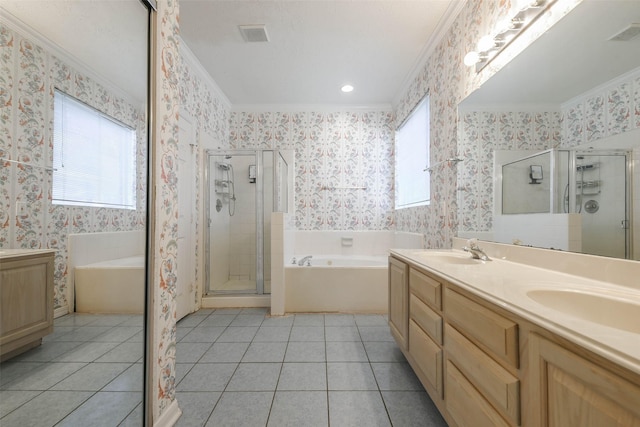 bathroom with tile patterned floors, crown molding, and vanity