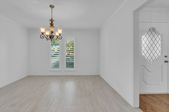 interior space featuring crown molding, a notable chandelier, and light wood-type flooring