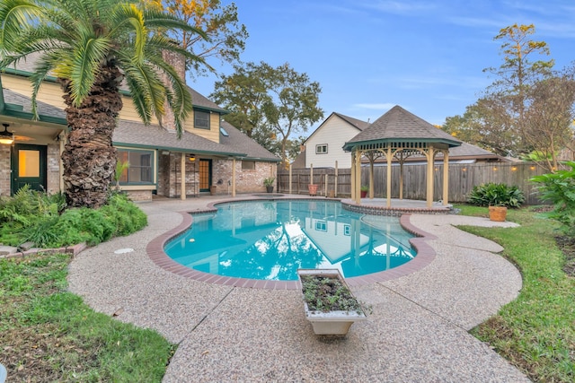 view of pool with a gazebo and a patio area