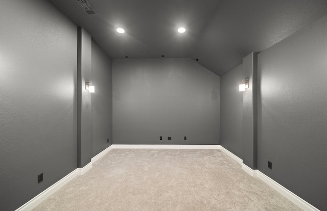 cinema featuring visible vents, vaulted ceiling, baseboards, carpet, and recessed lighting