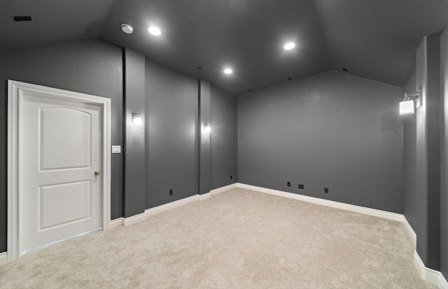 carpeted cinema room with baseboards, recessed lighting, and lofted ceiling
