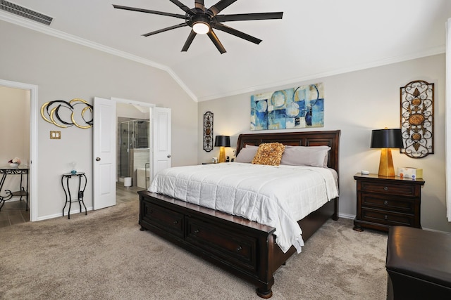 carpeted bedroom with connected bathroom, ceiling fan, lofted ceiling, and ornamental molding