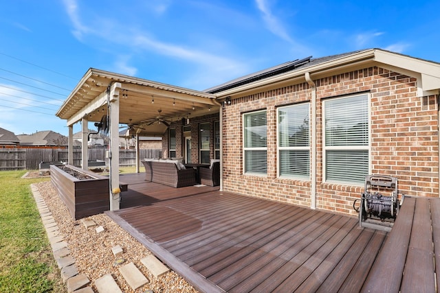 wooden deck with ceiling fan