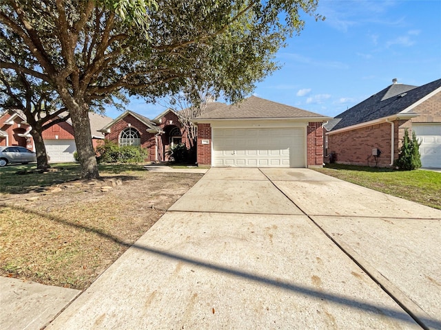 ranch-style home featuring a garage