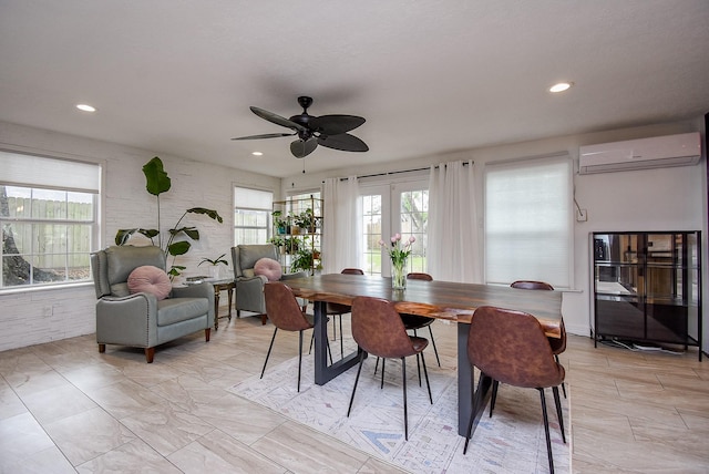 dining room featuring ceiling fan, an AC wall unit, and french doors