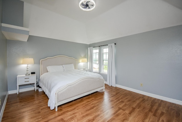 bedroom with wood-type flooring