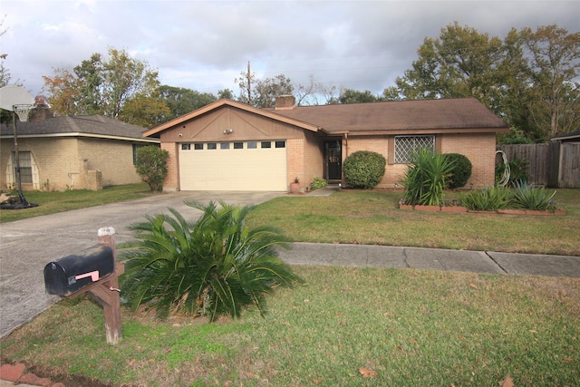 single story home with a front yard and a garage