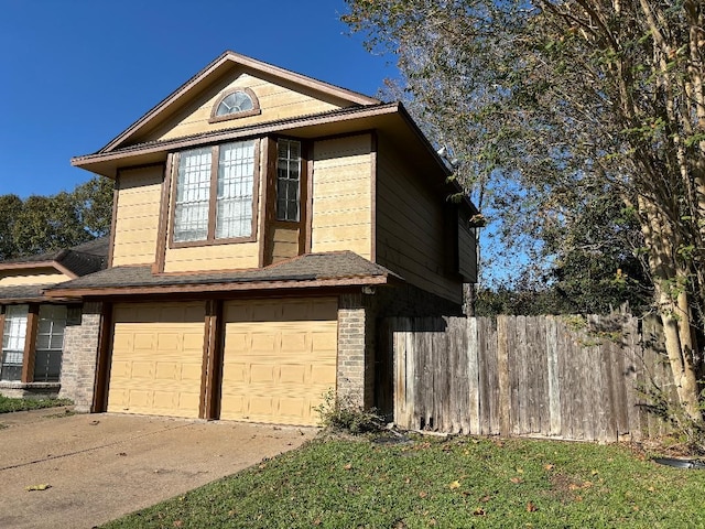 view of front of property featuring a garage