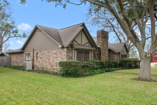 view of property exterior featuring a yard and central AC