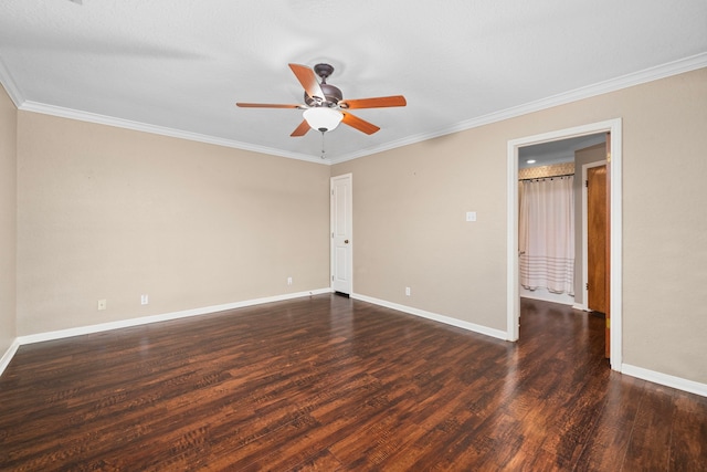 spare room featuring ceiling fan, dark hardwood / wood-style flooring, and ornamental molding