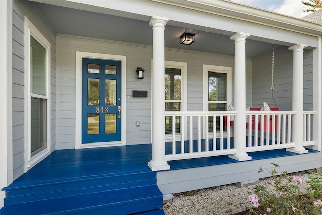 property entrance with a porch