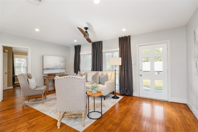 living room with light hardwood / wood-style floors