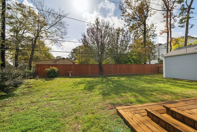 view of yard featuring a deck