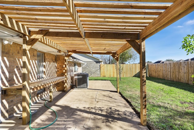 view of patio / terrace featuring a pergola and central AC