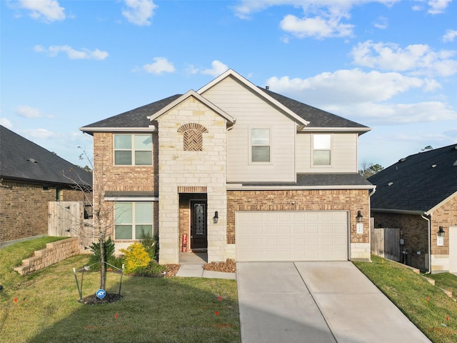 view of front property with a front yard and a garage