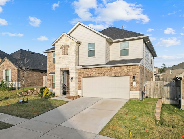 view of front of property with a front yard and a garage