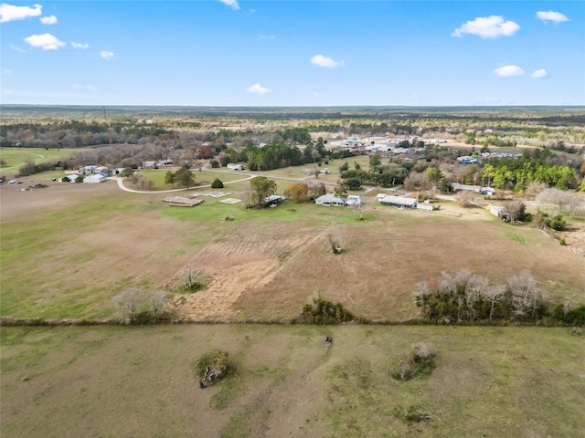 birds eye view of property featuring a rural view