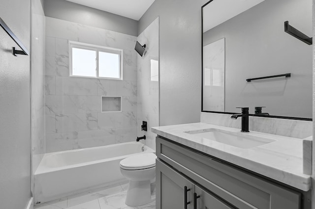 full bathroom with tiled shower / bath combo, toilet, and vanity