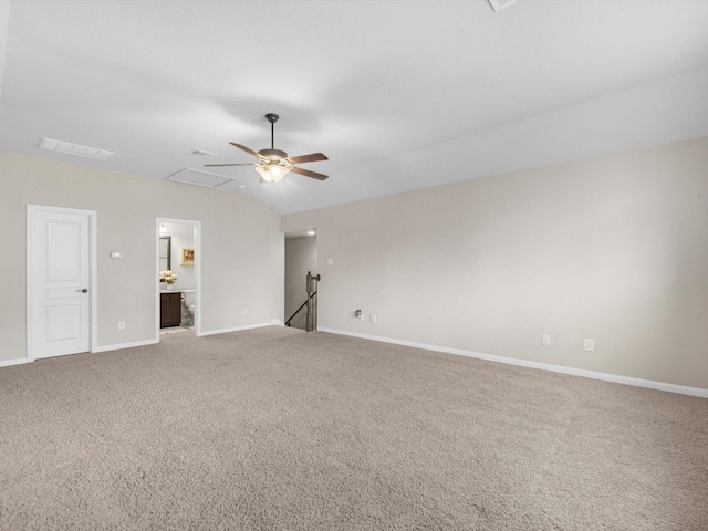 empty room with ceiling fan and carpet floors