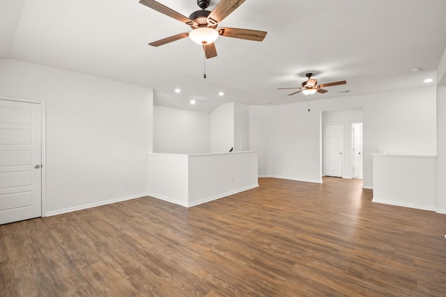 unfurnished room with dark hardwood / wood-style floors and ceiling fan