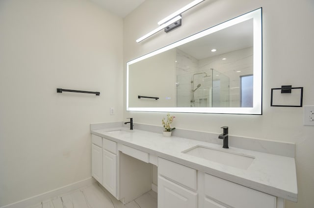 bathroom featuring vanity and a shower with shower door