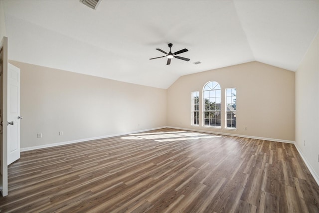 interior space featuring dark hardwood / wood-style floors, ceiling fan, and lofted ceiling