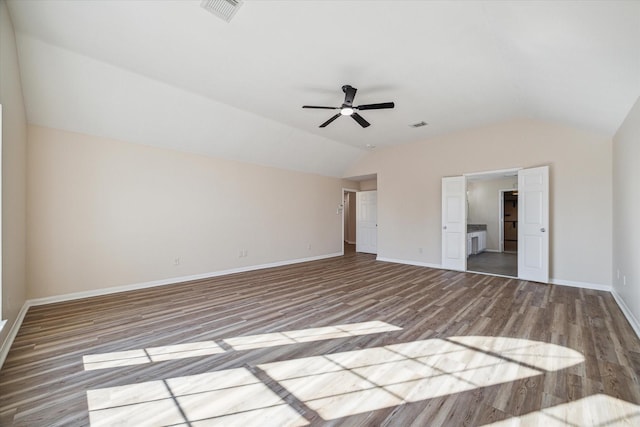 interior space featuring ceiling fan, light hardwood / wood-style flooring, and vaulted ceiling