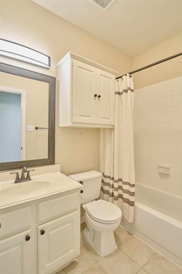 full bathroom with toilet, vanity, shower / bath combination with curtain, and tile patterned floors