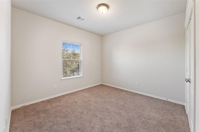 view of carpeted spare room