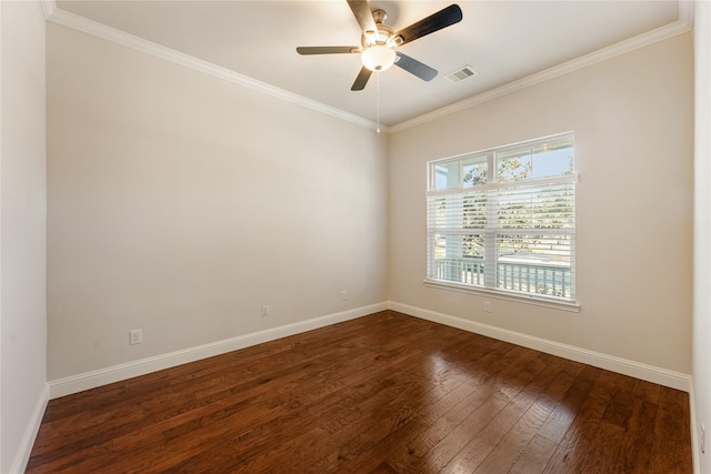 empty room with ceiling fan, crown molding, and dark wood-type flooring