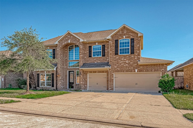 view of front of home with a garage