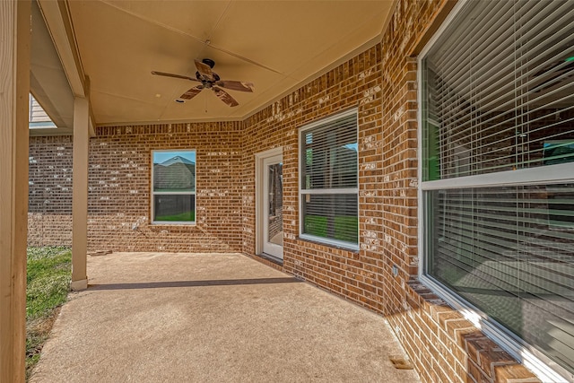 view of patio featuring ceiling fan