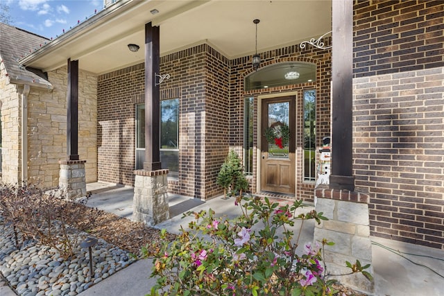 property entrance featuring covered porch